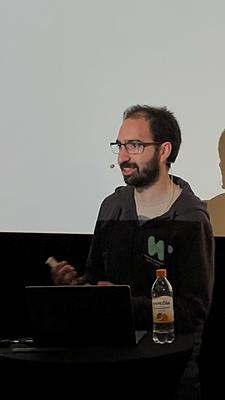 Close up of Youssef presenting