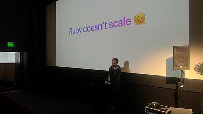 Youssef with ‘Ruby doesn't scale’ on the screen
