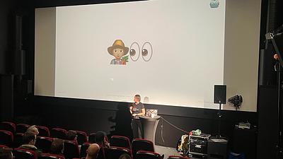 Hana with '👩‍🌾👀' on the screen